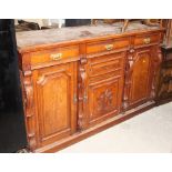 A late 19th / early 20th century oak sideboard,