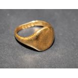 A Victorian 18 ct gold signet ring with plain oval face London 1856 weight 7g