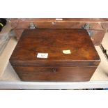 A 19th century figured mahogany work box with fitted interior