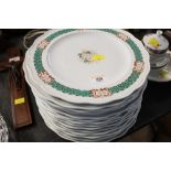 A number of floral decorated plates