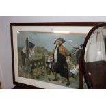 A framed and mounted print of figures in street scene