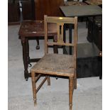 A black ash occasional table with drawer to base,