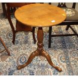 A 19th century oak tripod table