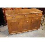 A mid 20th century Ercol style sideboard, with no label,