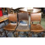 A group of 3 leather studded dining chairs