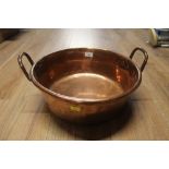A 19th century copper 2 handled pan