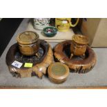 Two yew wood ashtrays or coasters, two turned wood cauldrons,