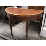 An Edwardian mahogany satinwood inlaid demi lune shaped table,