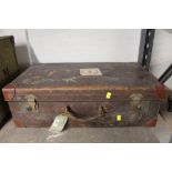 A late 19th / early 20th century brown leather suitcase