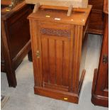 A late Victorian mahogany bedside cupboard,