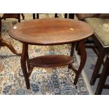 An Edwardian oval shaped mahogany occasional table