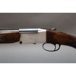 An Investarm 410 over/under shotgun, with 28" barrels, full and quarter choke, 76 mm chambers,
