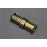 * A Kynoch's Patent 12 bore chamberless cartridge reloading tool, stamped 12 G.609 157 A.