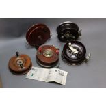 Three Alvey reels plus another.