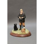 Border Fine Arts a figure titled "A Right and Left", model No. B0253B, with a black labrador.