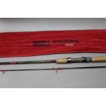 A Worcestershire sea trout spinning rod, in two sections, 8'.