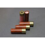 * Five 14 bore shotgun cartridges, to include four with Purdey & Sons end caps.