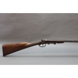 A 410 Belgian double barrelled hammer shotgun, with 28" barrels, cylinder and cylinder choke,