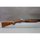 A Miroku 12 bore over/under shotgun, with 28" barrels, improved and quarter choke, 2 3/4" chambers,