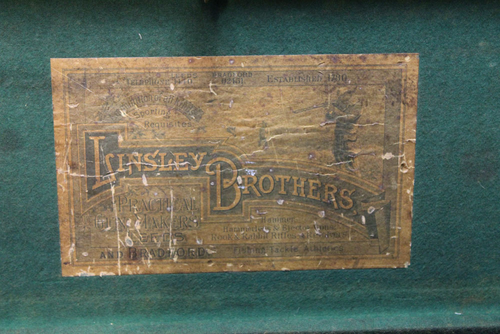 * Linsley Brothers, Leeds and Bradford, a leather and brass cornered shotgun motor case,