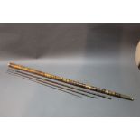 A late 19th/early 20th century cane and brass walking stick/fishing rod,