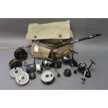 A vintage tackle bag, containing Mitchell 4450Z fixed spool reel, along with a 300A,