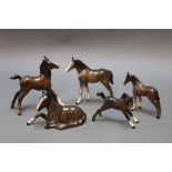 Five Beswick foals, brown.