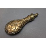 * A copper bodied powder flask with net design, length 21 cm.