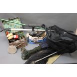 A vintage case containing vintage fishing tackle, reel, pike float etc,