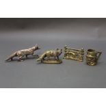 A fox car mascot, brass 6 cm together with other pieces of brassware, silver plated fox etc.