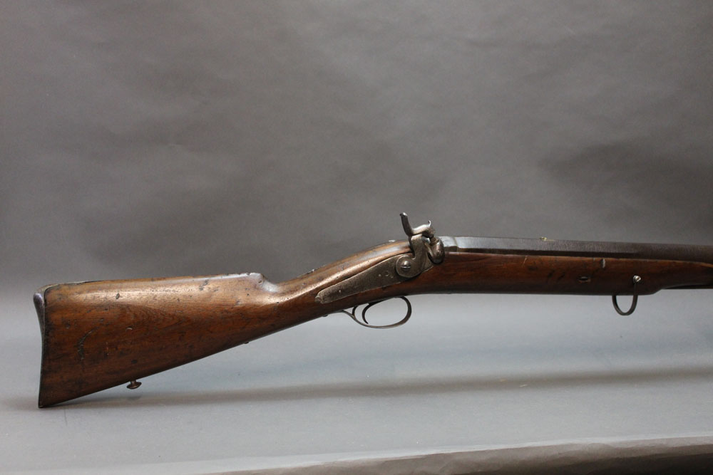 A percussion large calibre (possibly 4 bore) rifled gun,