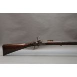 A three band Enfield percussion musket, marked to the lock 1862 Tower and with a Crown VR,