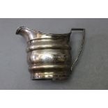 A Georgian silver jug,
