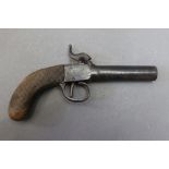 * A percussion pocket pistol, with 2 3/4" screw off barrel. Overall length 17 cm.