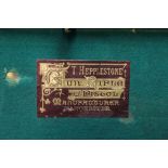 * T Hepplestone, Manchester, a leather shotgun motor case, marked to the top John A Porritt,