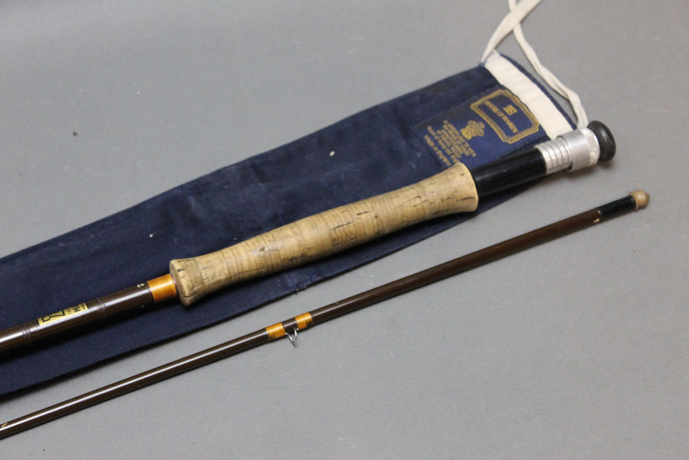 The House of Hardy, a trout fly rod in two sections, 9', line 6.