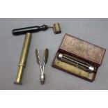 * A 19th century brass powder measure,