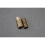 * Two Eley Needle Gun cartridges, the smaller marked 110. Length +/- 2.5 cm.