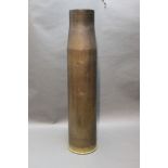 * A large brass artillery shell case. Height 70 cm width 16.5 cm.