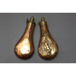 * Two copper and brass powder flasks,