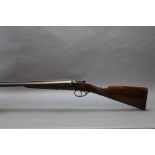 An AYA 12 bore side by side shotgun, with 28" chopper lump barrels, three quarter choke,