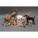 A Beswick terrier, a Russian badger, Coalport hunting mug and various other pieces of ceramics.