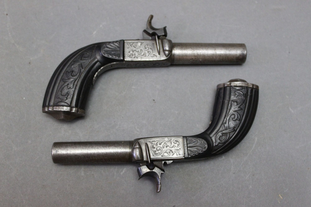 * A pair of steel percussion pocket pistols, with 2 1/2" barrels and fold down triggers, - Image 2 of 2