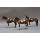 Three brown Beswick horses, a Bois Roussel racehorse, model No.