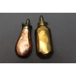 * Two powder flasks, both stamped Sykes Patent, the first of rectangular form 18 cm,