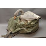 Eight lightweight foam greylag goose decoys, with bag.