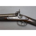 * A muzzle loading percussion side by side shotgun, with 30 1/2" barrels, the rib marked London,