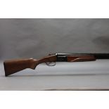 A Baikal 12 bore over/under shotgun, with 28 1/2" barrels, half and full choke, 2 3/4" chambers,