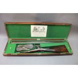 * A percussion muzzle loading side by side shotgun, with 31 1/2" Damascus barrels,