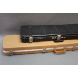 Two gun cases, smallest 32" across, largest 48".